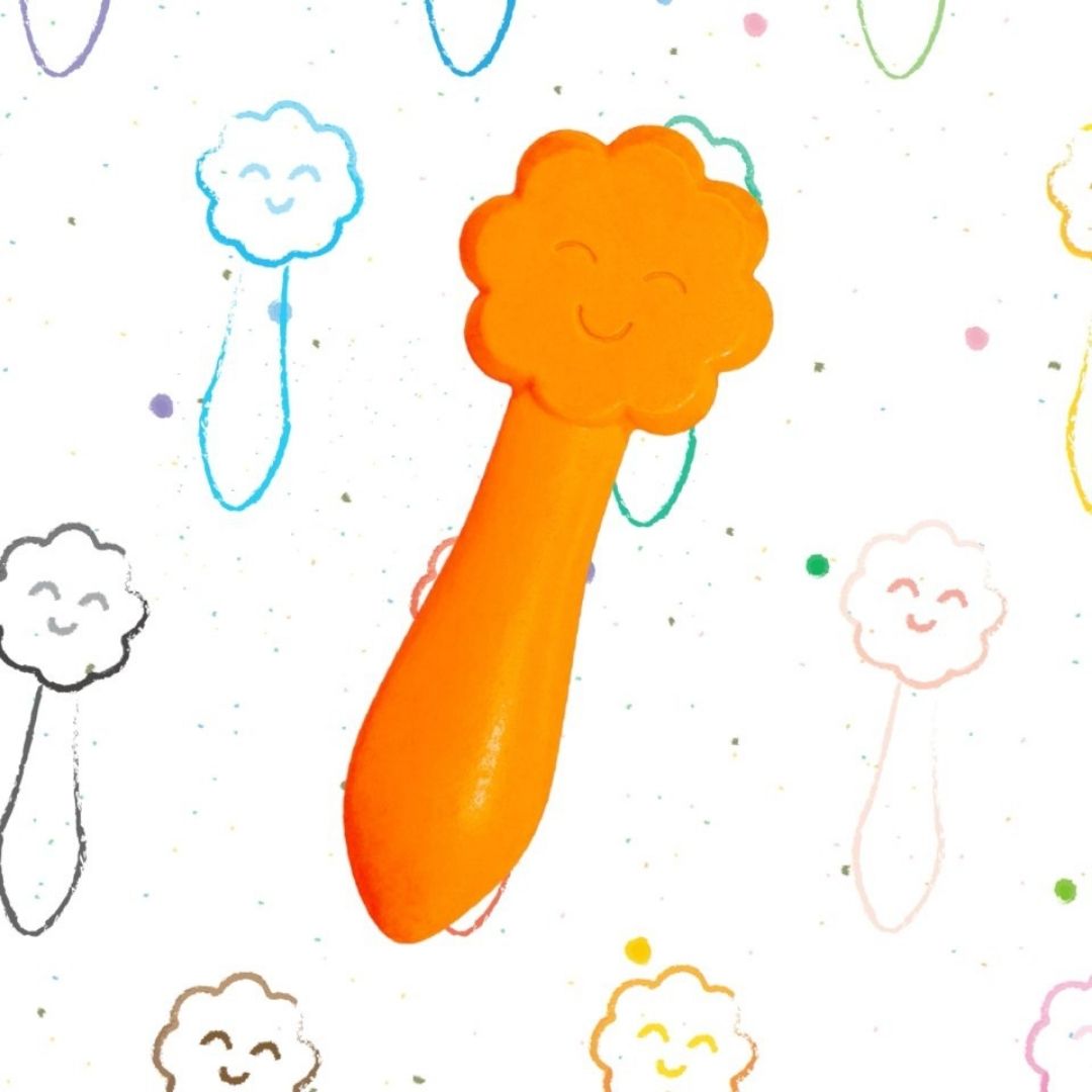 Smilende ornge farve fra Haku Yoka lavet med bivoks fås hos Nordic Simply