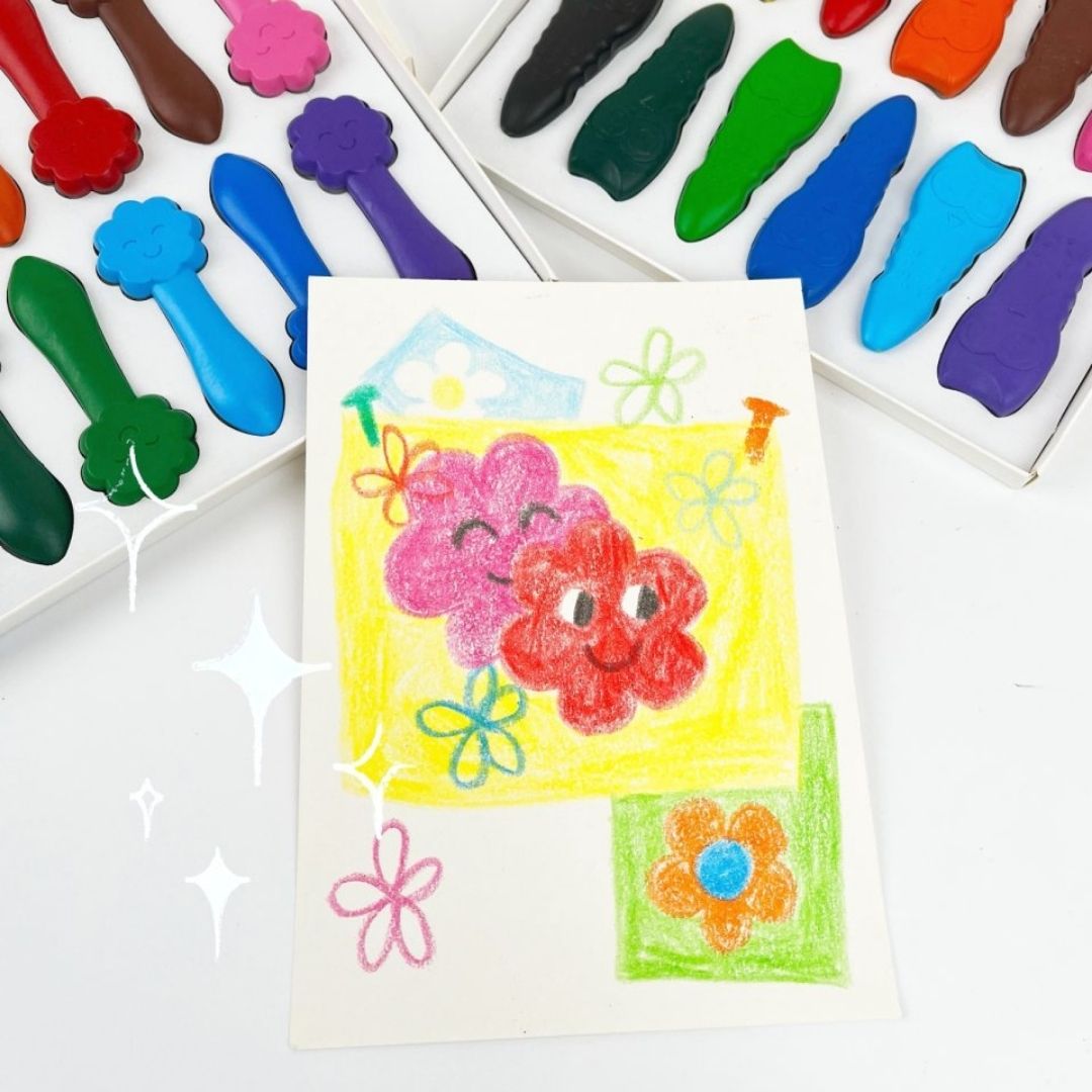 Smilende ansigter og børnetegning af blomster i glade farver fra Haky Yoka