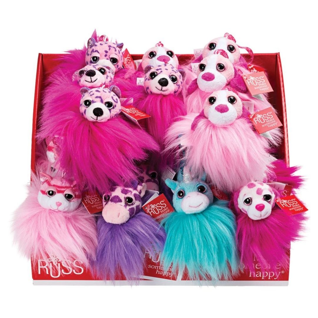 Farverige nøgleringe med pelsdyr i forskellige fantasifulde farver til skoletasken.