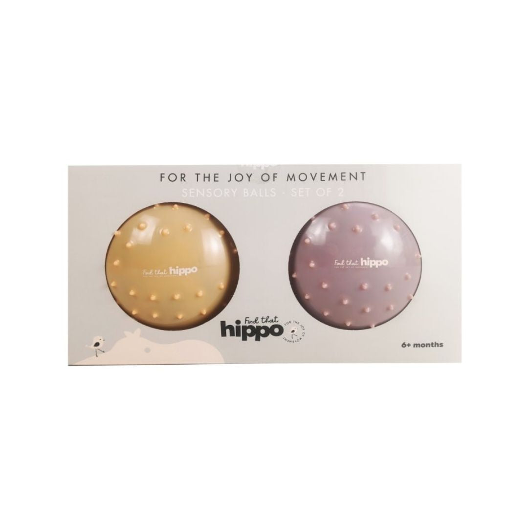 sæt af to sansebolde med knopper i gul og rosa i æske, fra Find that Hippo fås hos Nordic Simply