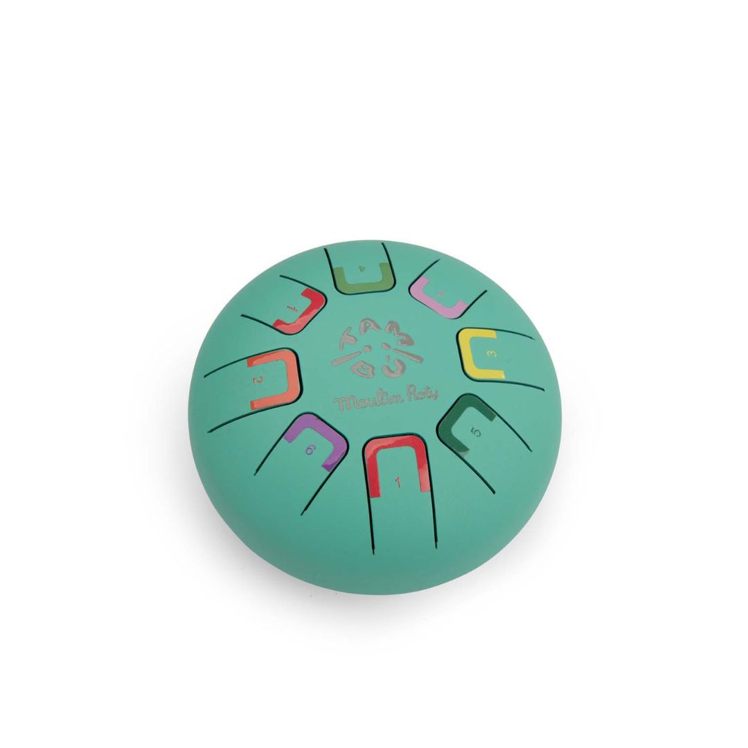 Turkis sansetromme med bløde toner til børn, 15 cm, med 8 fine toner, perfekt til musikleg og sanseudvikling.