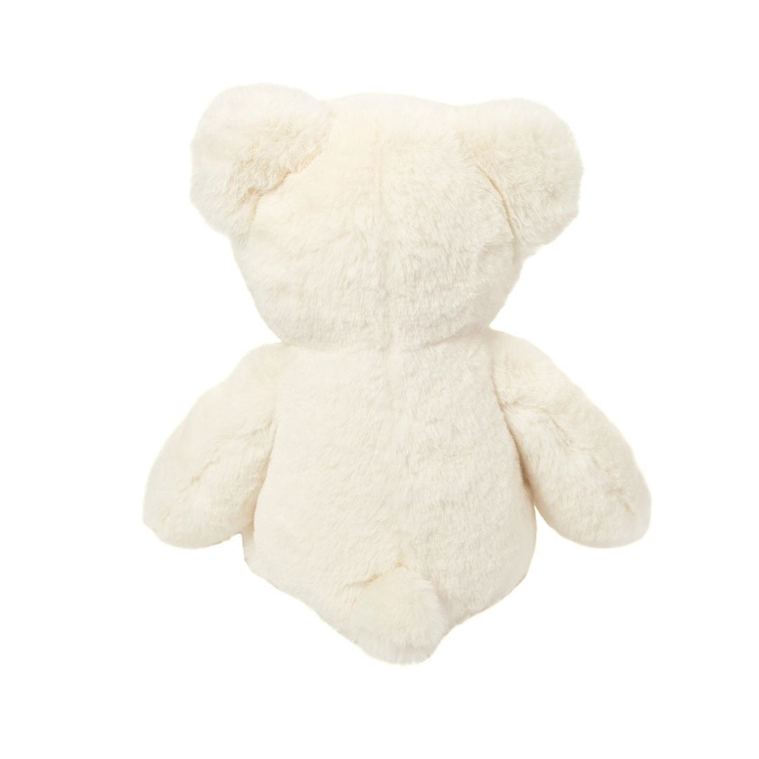 Ultrablød hvid teddybamse, der sidder set bagfra, en krammebamse til børn godkendt fra 0 mdr. Kvalitetsbamse fra Teddy Hermann Tyskland fås hos Nordic Simply