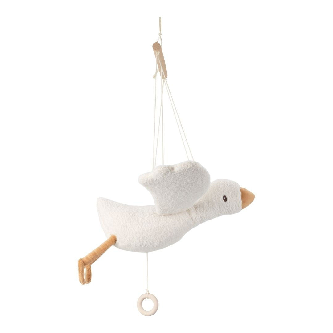 Hvid gås på uro, set svævende yndefuldt i luften, tilføjer r og eventyr til børneværelset og over puslebordet