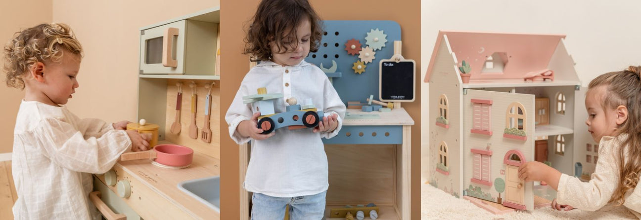 barn leger i lysegrønt legekøkken, dreng med bil i træ foran blå arbejdsbænk i træ, pige lægger på lyst gulv og leger med stort lyst dukkehus med rosa tag, gode julegaver til børn 3 år hos Nordic Simply