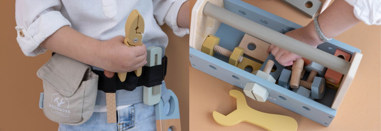 barn med værktøjsbælte og knibtang i træ, hånd finder skruer og møtrikker i blå værktøjskasse i træ, legeværktøj til håndværkerleg hos Nordic Simply
