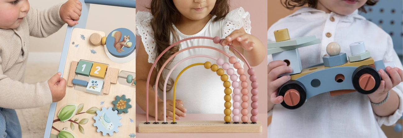 barn med blå Little Dutch gåvogn, pige med rosa kugleramme, dreng med legetøjsbil lavet ved Little Dutch arbejdsbænk. Little Dutch legetøj på tilbud hos Nordic Simply