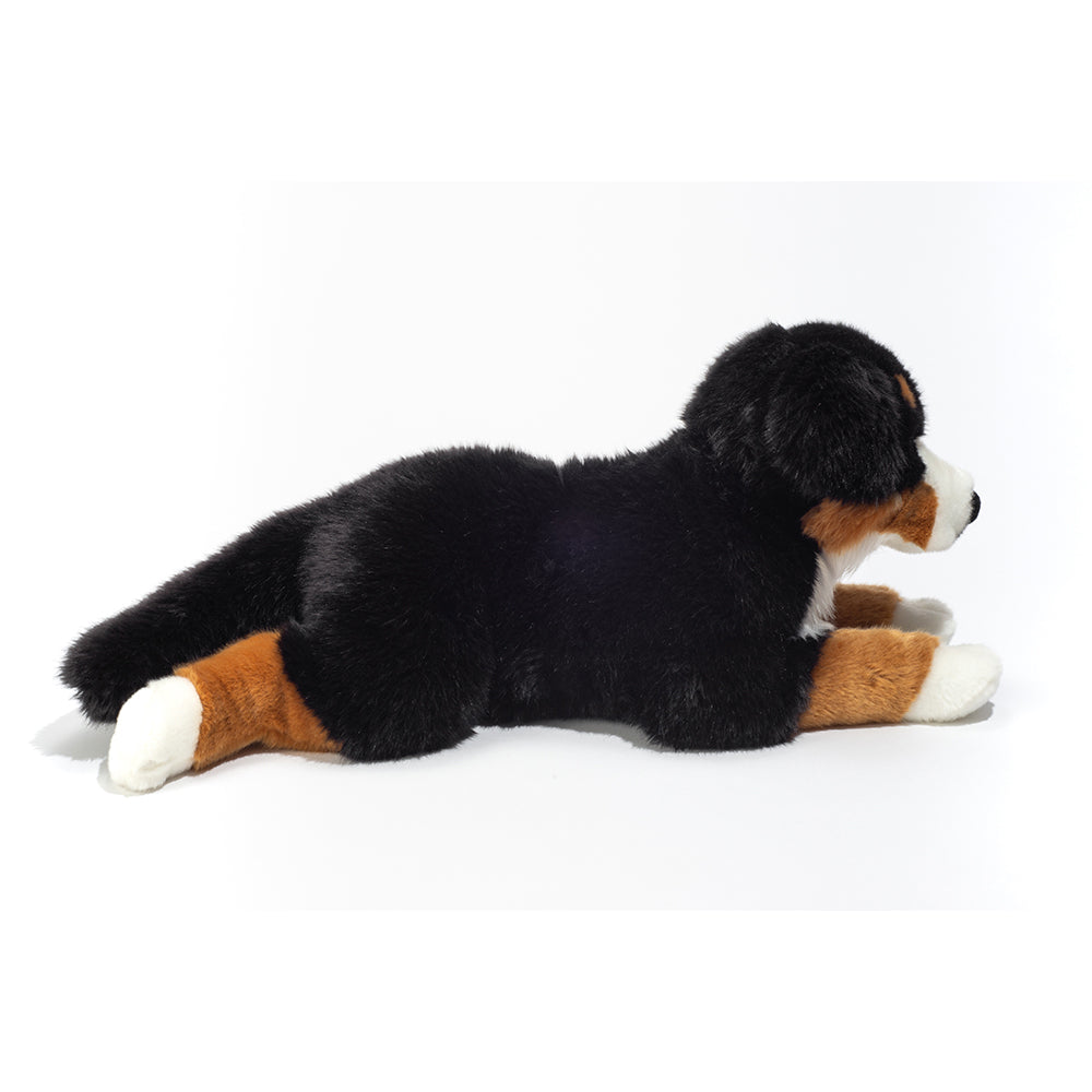 berner sennen bamsehund, stor sød og blød hundebamse, der ligger ned, her set bagfra, måler hele 60 cm.