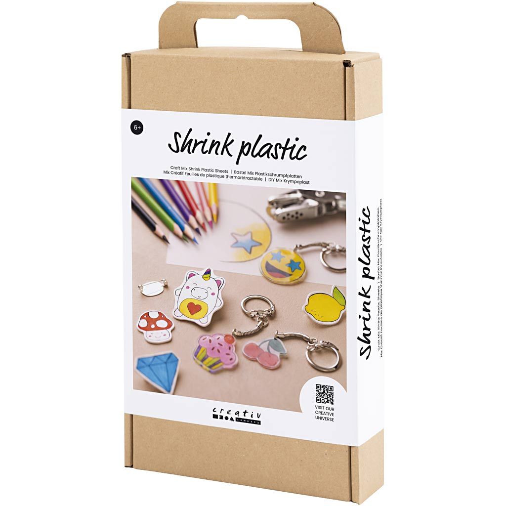 stor brun æske med foto af accessories og nøgleringe lavet i krympelast. Kreativitetssæt fra 6 år og op.