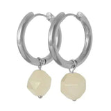 Øreringe i sølv med facetslebet rosenkvarts vedhæng. Statement hoops, du kan mikse og matche med andre øreringe og smykker. 