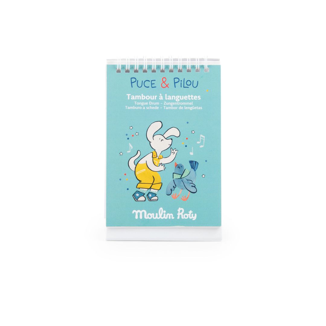 Sansetromme turkis, 20 cm - her ses musikhæfte til at spille efter på tungetromme til børn.