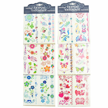 6 ark med midlertidige tatoveringer til børn, her med motiver af blomster og sommerfugle i pink og grønne farver.
