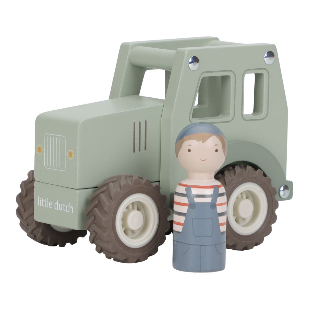 Grøn traktor i træ med træfigur foran. Perfekt legetøj til tumling fra 18 måmeder og op.